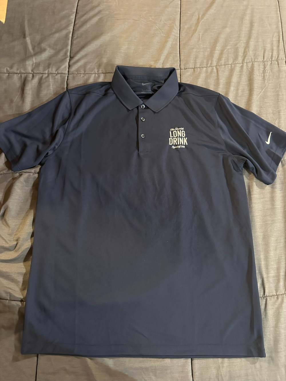 Nike Black Polo Shirt with White Swoosh